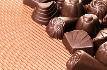 assorted chocolates on brown