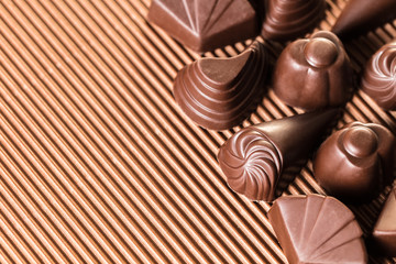 assorted chocolates on brown