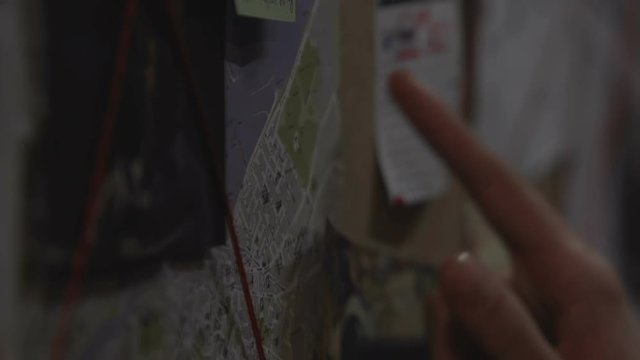 Policeman guessing next crime place using deductive method of investigation