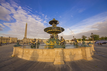 Fototapeta na wymiar A fountain and the Obelisk on Concorde square (Place de la Concorde) in Paris, France