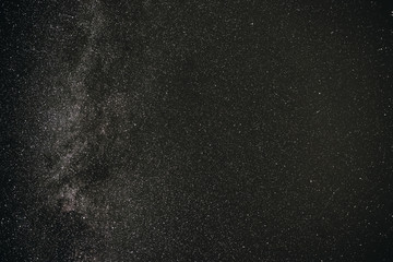 Background of gray starry night sky with the Milky Way