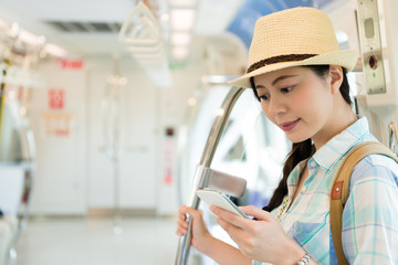Young woman travel with using a smartphone