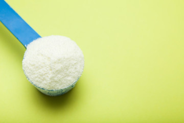Powdered milk - balanced baby food. Copy space.