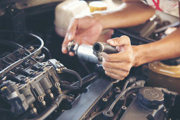Mechanic Car Service in automobile garage auto car and vehicles service mechanical engineering. Automobile mechanic hands car repairs automotive workshop service center. Services car engine machine.