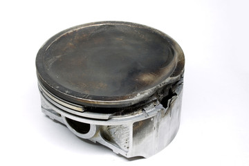 old piston on white background