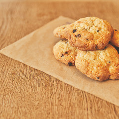 Sweet cookies pile on craft paper