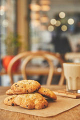Chocolate chip cookies in cafe on table with coffee