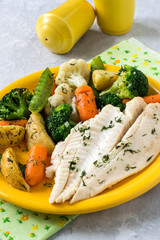 Flounder baked with vegetables