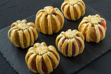 Apples stuffed with chicken liver and cheese in puff pastry