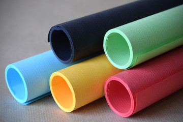 Multicolored paper tubes background graphic resource. Graphic design resource that shows a multicolored paper tubes. Contrast of tone. Vivacity and color energy.