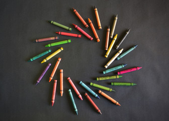 Color swirl formed by coloring waxes. Movement effect. Colorful graphic design resources and...