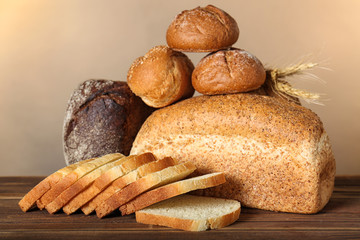 Freshly baked bread products on table