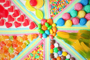 Colorful candies on light background