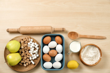 Set of kitchenware and products on wooden background. Cooking master classes