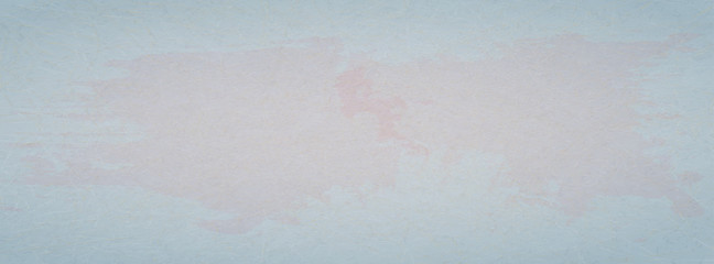 Grunge, scratched light blue background with red spots of paint.