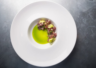 Fresh tartar served on a white plate