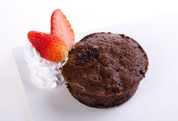 Chocolate fondant lava cake with strawberries