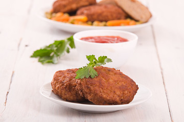 Meatballs on white dish. 