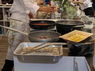 Cooking inside Restaurant's Kitchen, Pans and Chef with Uniform