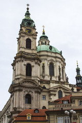 Fototapeta na wymiar The Church of Saint Nicholas is a Baroque church in the Lesser Town of Prague. Czech Republic