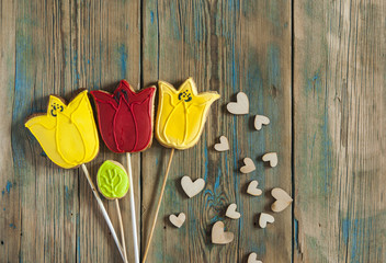 Cookies in shape of flowers tulips. Top view, place for text,copy space