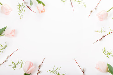 Flowers composition. Frame made of pink flowers on white background. Valentine's Day. Flat lay, top view.