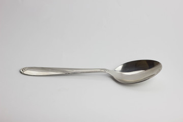 metal spoon close-up isolated on white background