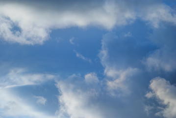 Fototapeta na wymiar Dense blue sky with clouds