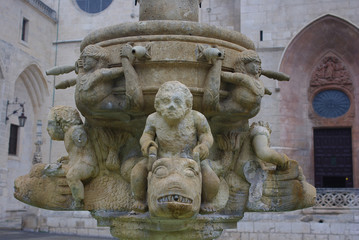 Fototapeta na wymiar Detail of the medieval fountain on Plaza de Santa María in Burgos, Spain 