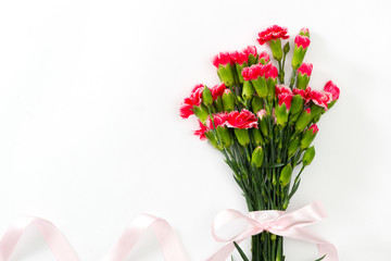 Pink lovely flowers on white background. Festive greeting card