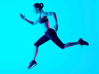 Fototapeta na wymiar one mixed races woman runner running isolated on blue blackground