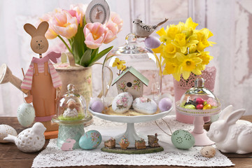 Easter decoration under glass dome on the table © teressa