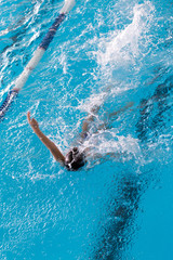 boy on a swim in a sports pool