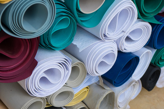 Shoes factory concept: Rubber sheets row and pile in factory.