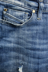 Close-up of a blue jean trousers, pocket