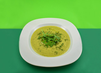 Vegetable Soup stock images. Green soup on a green background. Healthy snack images