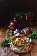 rustic kale soup with meat and sausage
