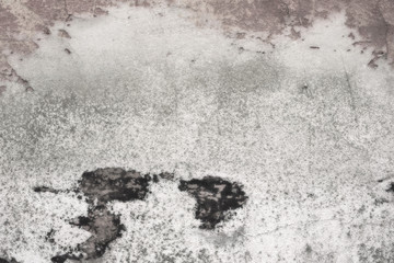 Wall fragment with scratches and cracks