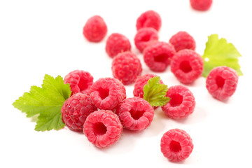 raspberry and leaf isolated on white background