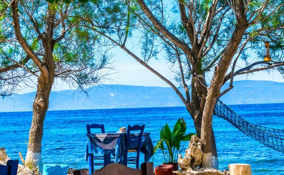 A beautiful sitting place in the shade in the Aegean Sea on the island of Lesbos directly by the sea with a view of Turkey.