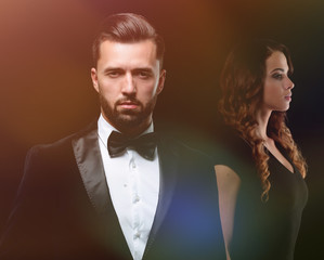 gentleman with his girl posing in the studio