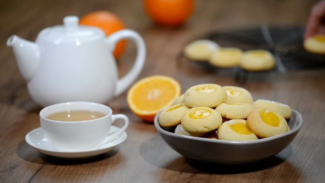 Cookies with orange marmalade. Put in a bowl orange cookies