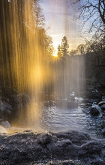 Behind the sunset waterfall