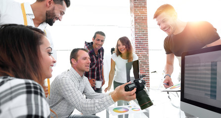 Graphic designer at work. Color swatch samples.