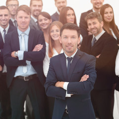 Fototapeta premium leader standing in front of a large business team