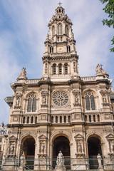 Naklejka na ściany i meble Clock tower of Sainte trinite, roman catholic church in Paris, France