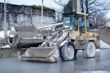 a bulldozer in freezing cold