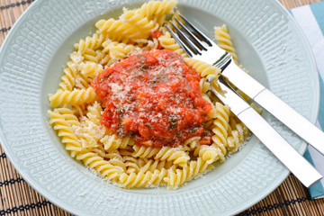 Fusilli pasta with tomatosauce, basil and parmesan 