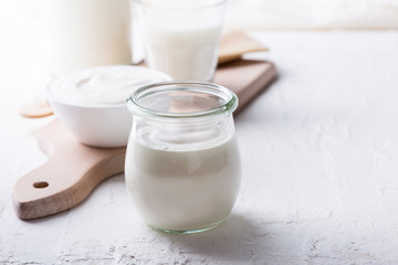 Organic sour cream in in glass jar