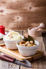 Homemade pickled mushrooms and mashed potatoes